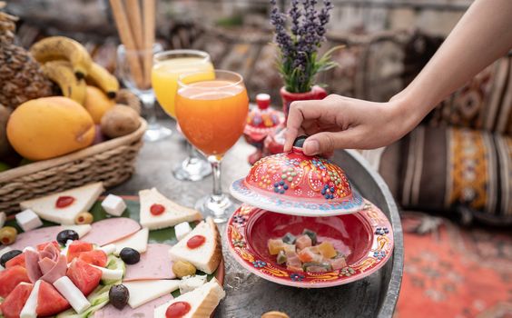 Breakfast with great landscape on rooftop of cave house in Goreme city, Cappadocia Turkey.