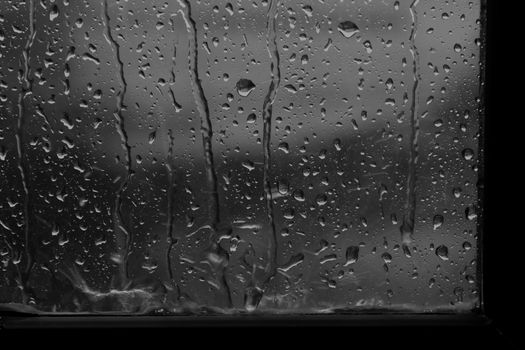 rain, raindrop on window glass fresh for background