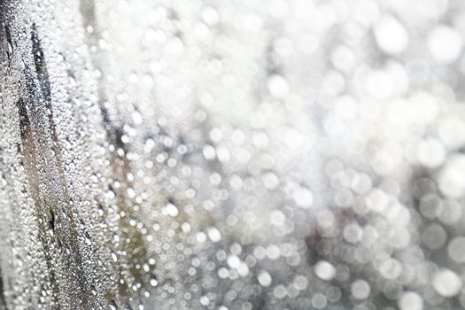 Water drop fresh condensation on window glass texture, rainy season wet background cooling feels and cold, raindrops texture wet transparent bubble