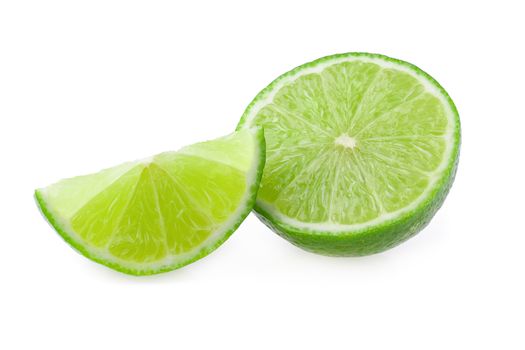 Half with slice of fresh green lime isolated over white background.