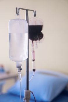 Spare blood bags from laboratory medical hanging on a steel pole at the hospital In order to prepare blood for the veins of the patients who want to donate blood in the same group