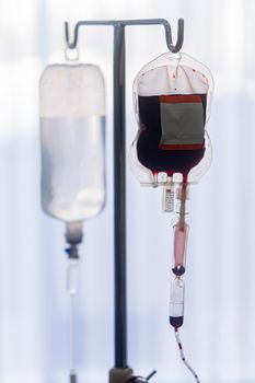 Spare blood bags from laboratory medical hanging on a steel pole at the hospital In order to prepare blood for the veins of the patients who want to donate blood in the same group