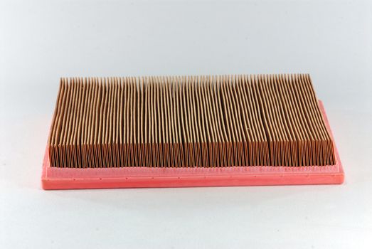 Car air filter isolated on white background