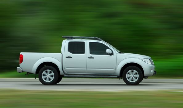 pick-up photographed driving fast