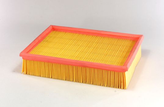 Car air filter isolated on white background