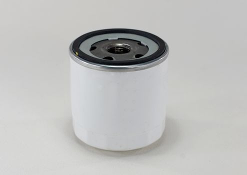 Oil filter enclosed in a metal housing