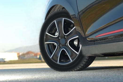 aluminium Wheel on a black sport car