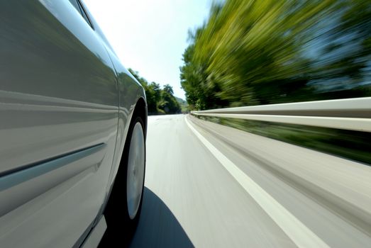 the wheel of passenger cars photographed in high speed