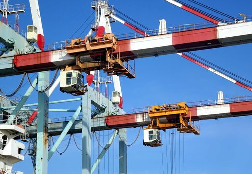 Large cranes used for loading containers on to ships