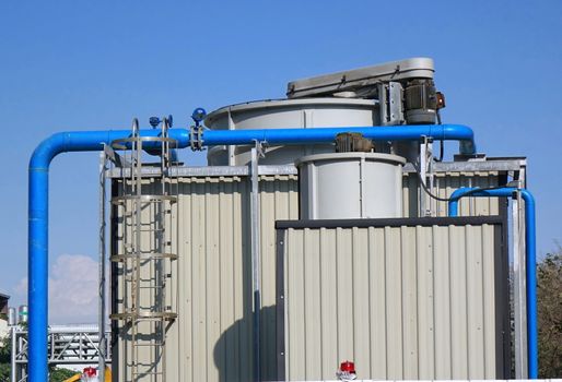 Large industrial air conditioning system with vents and fan towers