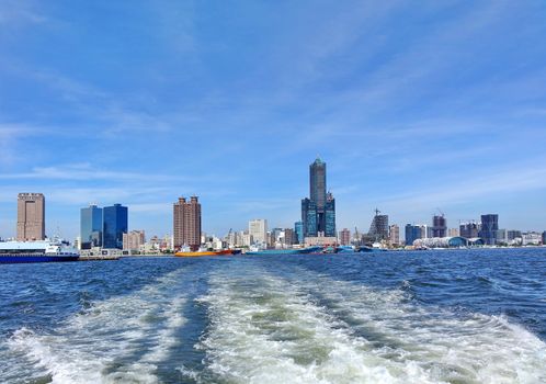 The skyline of Kaohsiung City in Taiwan seen from the harbor