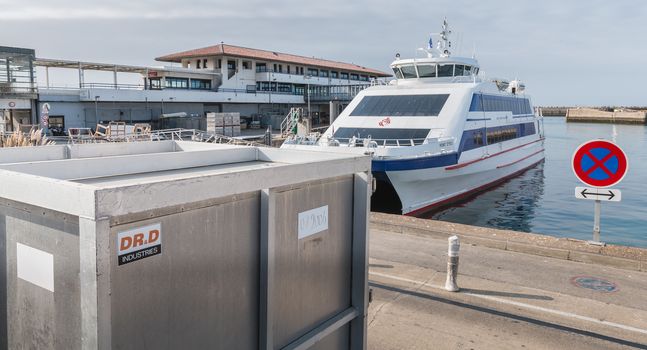 Port Joinville on the Isle of Yeu, France - September 18, 2018: Ferry Yeu Bridge of the company Yeu Continent parked in the sea port of Yeu Island on a fall day