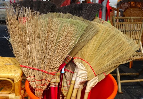 Handcrafted brooms made from bamboo twigs and branches