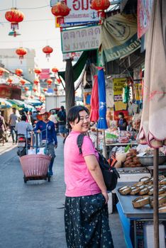 Samut Sakorn, Thailand - February 15, 2020 : Unidentified asian woman shopping at Mahachai market is seafood market can buy dried and fresh seafood from seller in cheap price.