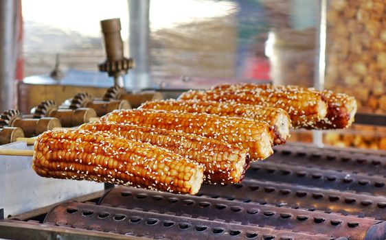 Grilled corn cobs with barbecue sauce are a popular street food in Taiwan