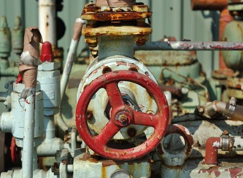 Abandoned industrial equipment is left to corrode and rust