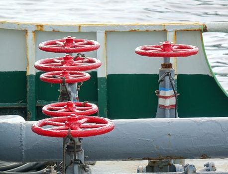 Pipes and control valves on an oil supply ship
