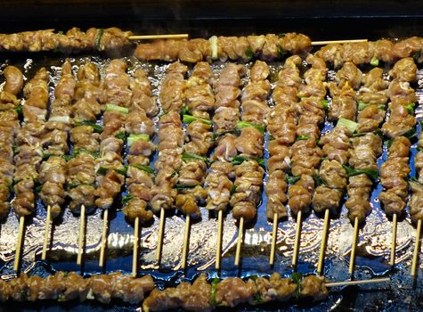 A street food stall in Taiwan offers fresh meat skewers