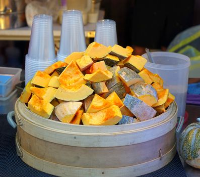 A street vendor sells shakes made from freshly cooked squash