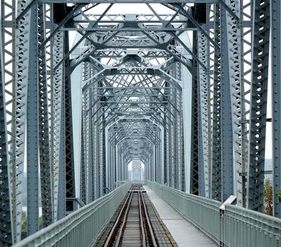 Vintage iron railway bridge dating back one hundred years