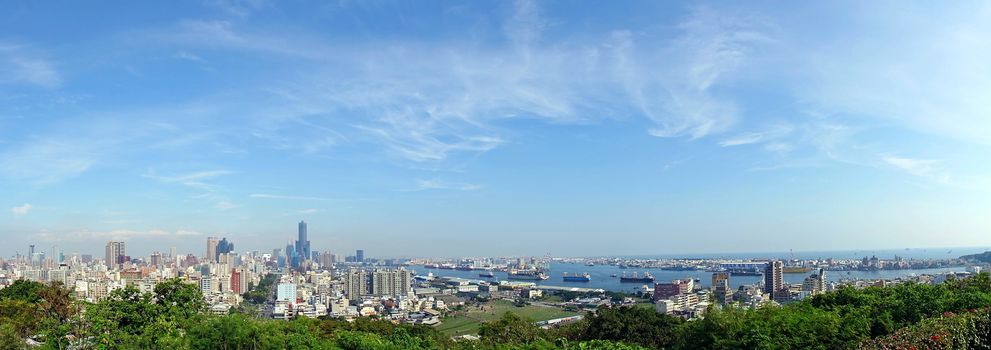 The skyline of Kaohsiung City in Taiwan and a view of the harbor seen from Longevity Hill

