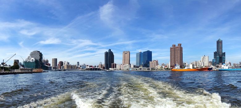 The skyline of Kaohsiung City in Taiwan seen from the harbor