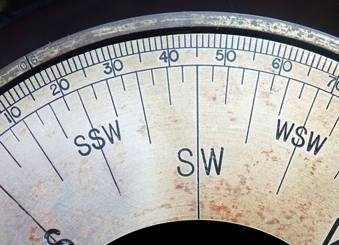 Detail of an old compass rose showing southwest