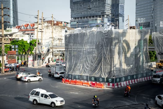 Bangkok, Thailand - November 15, 2019 : Cars on busy road in the Bangkok city, Thailand. Many cars use the street for transportation in rushhour with a traffic jam