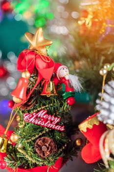 Christmas background with decorations and gift boxes on wooden