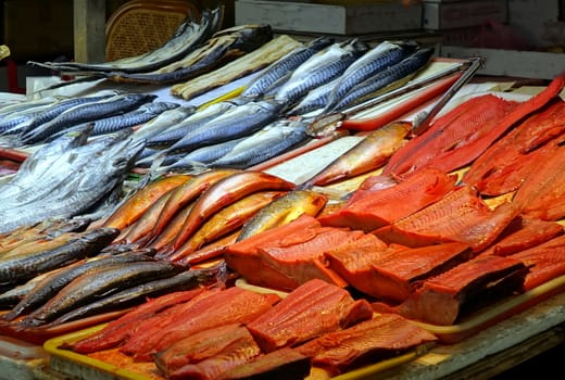Salted and preserved fish is on sale at the market
