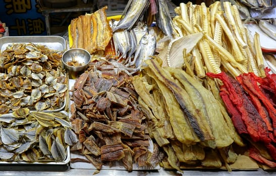 Various kinds of dried and preserved fish on sale