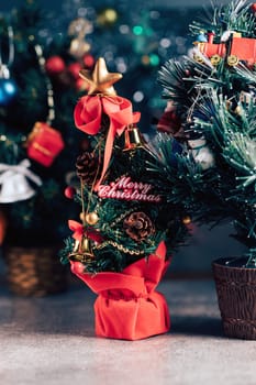 Christmas background with decorations and gift boxes on wooden