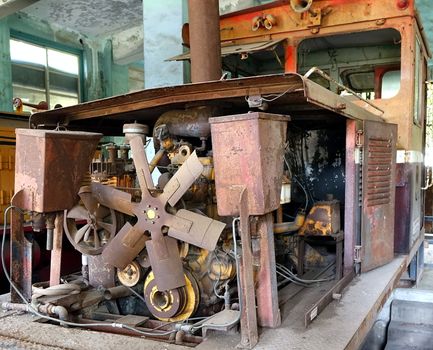 A rusty and broken vintage diesel train engine from about 70 years ago