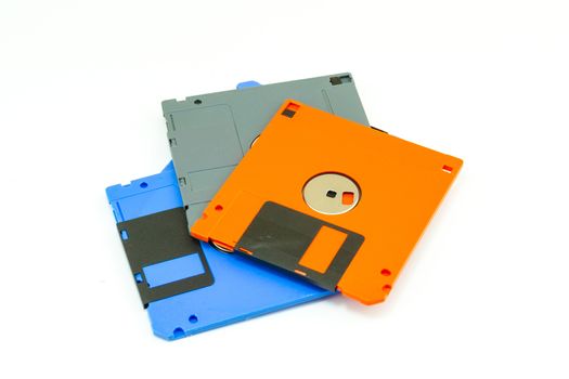 A floppy disk , also called a floppy, diskette , or just disk were a ubiquitous form of data storage isolated on white background