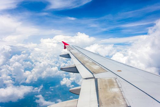 View from airplane window to see sky on evening time