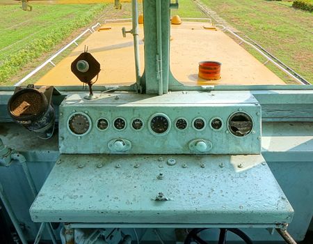 The interior of the driver cabin of an old diesel train
