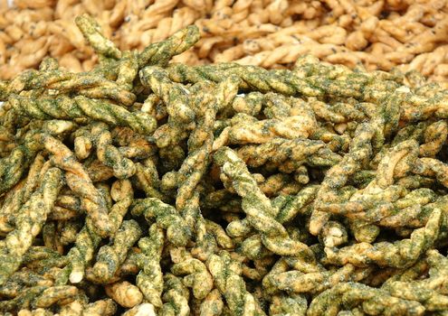 Chinese fried cookies sprinkled with seaweed crumbs

