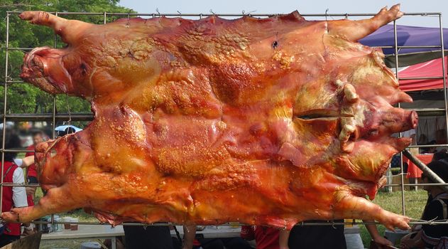 A traditional whole flattened pig barbecue in Taiwan 