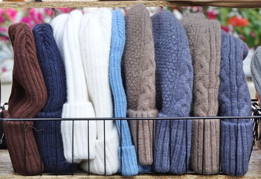 A street vendor in Taiwan sells warm hats for winter