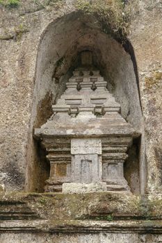 Udayana Dynasty Royal Tombs. Ancient royal tombs at Gunung Kawi Temple. Funeral complex centered around royal tombs carved into stone cliffs in the 11th century. Bali, Indonesia.