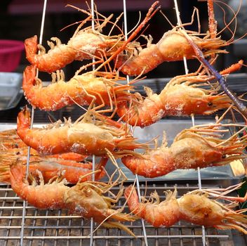 Large prawns are ready to be grilled at an outdoor market in Taiwan