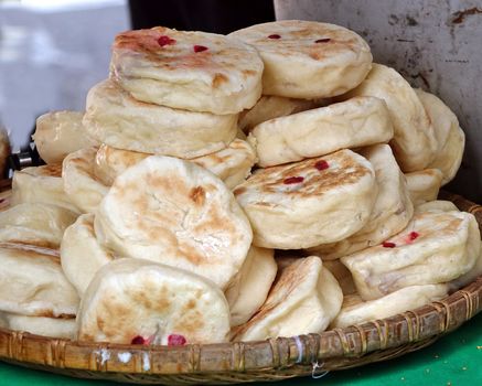 Chinese steamed and fried buns stuffed with meat and vegetables