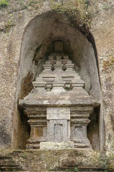 Udayana Dynasty Royal Tombs. Ancient royal tombs at Gunung Kawi Temple. Funeral complex centered around royal tombs carved into stone cliffs in the 11th century. Bali, Indonesia.