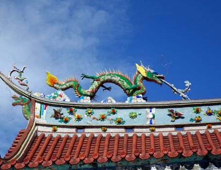 Chinese temple roof ridge decorated with mythological beasts