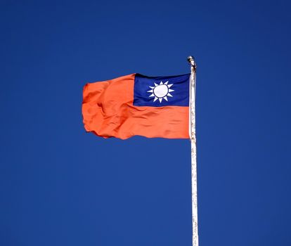 A flag of the Republic of China, Taiwan, is blowing in the wind
