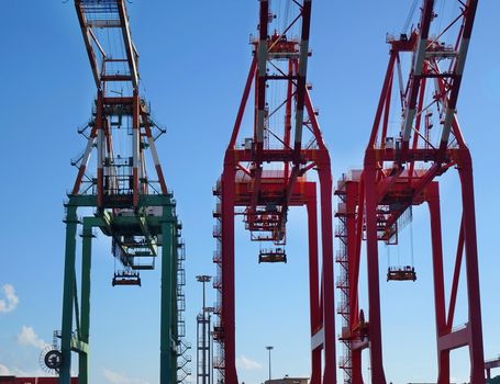 Large cranes used for loading containers on to ships