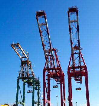 Large cranes used for loading containers on to ships