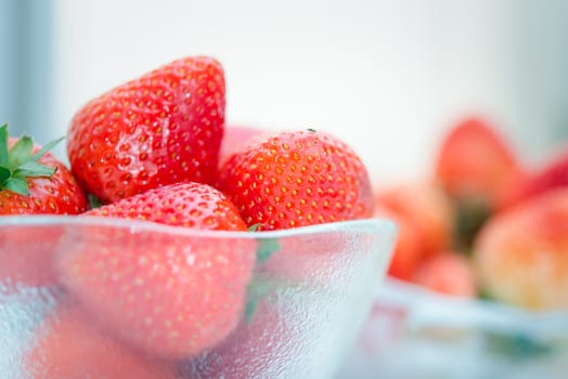 Strawberry is red fresh berry fruit color and sweet juicy for sale at Thai street food and fruit market in concept food and fruit, healthy eating in life