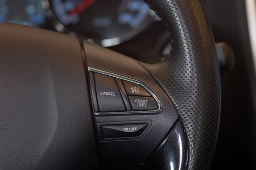 cruise control stick which is located on the wheel