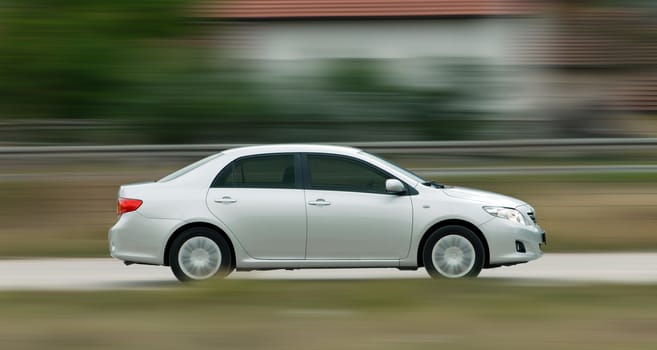 driving too fast, car photographed at high speeds